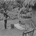 Two women washing themselves, Panguma, 1934-1936