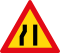 Road narrows on left side