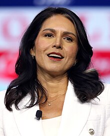 Headshot of Tulsi Gabbard speaking at an event in Detroit, Michigan