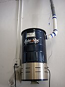 The power unit and canister of a central vacuum cleaner system