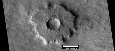 Pedestal crater, as seen by HiRISE under HiWish program. Top layer has protected the lower material from being eroded. The location is Casius quadrangle.