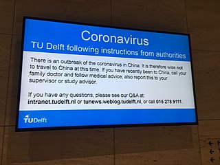 Announcement on a television screen at Delft University of Technology in the Netherlands, advising students not to travel to China (19 February 2020)