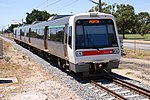 Transperth 3'6" gauge 2-car emu No.209 between Bassendean and Ashfield on a Midland – Perth service