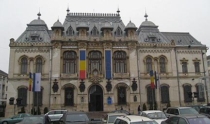 The Commerce Bank building [ro] in Craiova (finished by Constantin Iotzu [ro] in 1916), Strada Alexandru Ioan Cuza no. 7, now the Craiova City Hall