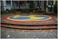 A tiled triskelion in a park in Tokyo, Japan.