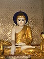 Burmese style Buddha, Shwedagon pagoda, Yangon.