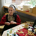 Woman fabricating a traditional juppe costume in Bezau (2007)