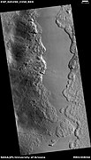 Wide view of part of Milankovic Crater, as seen by HiRISE under HiWish program Many depressions here contain ice in their walls.