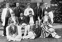 Black and white photograph showing a cricket team