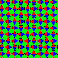 One of the colorings of the snub square tiling; the glide reflection lines are in the direction upper left / lower right; ignoring colors there is much more symmetry than just pg, then it is p4g (see there for this image with equally colored triangles)[4]