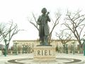 Louis Riel statue behind Manitoba Legislature