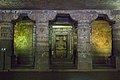 Pillar capital arrangement with round column and capital with rectangular section at Ajanta Caves.