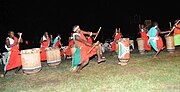 Drummers around a central drum