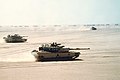 US M1 Abrams move out on a mission during the Gulf War.