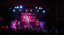 Mindless Self Indulgence onstage in 2012