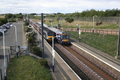 Musselburgh railway station, showing a local eastbound (North Berwick) train, and a westbound (Edinburgh) intercity (125) train