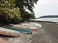 Aluminum flat-bottomed boats ashore for storage