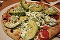 California club pizza with avocados and tomatoes.