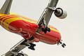 The landing gear of a Boeing 767 retracting into the fuselage