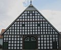 In Ravensberg Land the gables are usually decorated with a post known as a Geckpfahl.