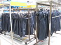 The process of washing and drying jeans.