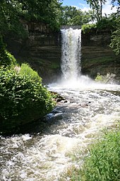 Minnehaha Falls surrounded by green summer foliage