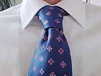 The necktie originates from the cravat, a neckband made from silk[35][36][37]