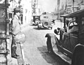 Image 27A Tokyo taxi driver indicating a fare of 50 Sen by holding up five fingers, in 1932 (from Transport in Greater Tokyo)