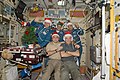 Crewmembers celebrating Christmas in Zvezda