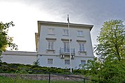 Flag of the Islamic Republic flying at the Iranian Embassy in Oslo.