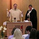 A Methodist minister celebrating the Holy Eucharist