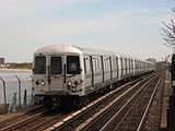 An overhauled NYCTA-operated R44 train on the at Broad Channel.