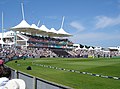 Main pavilion at the Rose Bowl. The England team are taking to the field in a friendly match against Hampshire.