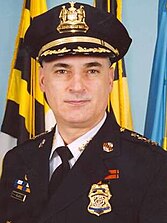 Police portrait of Frederick H. Bealefeld III smiling in police uniform