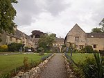 Leckhampton Court with wall and gate piers