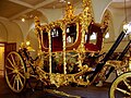 A close up of the Gold State Coach