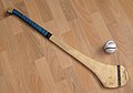 Image 48Hurling ball (sliotar) and hurley (camán) (from Culture of Ireland)