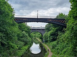 slender metal bridge over deep valley