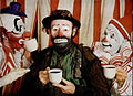 Emmett Kelly in his "Weary Willie" persona (center) with two Ringling Bros. whiteface clowns in a 1953 advertisement for the Pan-American Coffee Bureau