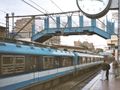 Mar Girgis Station on Cairo Metro Line 1 in 2002. Lines 1 and 3 use overhead lines rather than third rail for electrification.