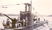 The S-class British submarine HMS Sibyl in harbour at Trincomalee, Ceylon.