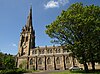 An impressive church with a pinnacled west steeple