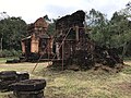 Two ruined library houses at the E group, the one behind recently been rebuilt by anastylosis.