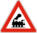 А33 Level crossing without barriers ahead