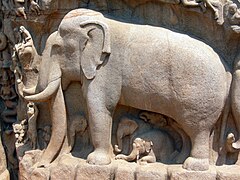 Elephant and other creatures carved in granite at Mahabalipuram.