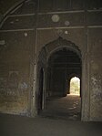 Arched entrance to halls inside Maqbara.