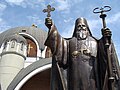 Statue of Dositheus II in front of the church.