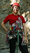 Rock climber with equipment