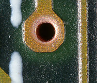 Plated-through holes on a multilayer board (magnified)