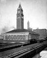 View from the southeast with the Smith Tower under construction in the background, 1913